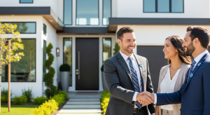 Realtor shaking hands with smiling clients outside a modern home.