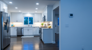 Updated white kitchen with stainless steel appliances